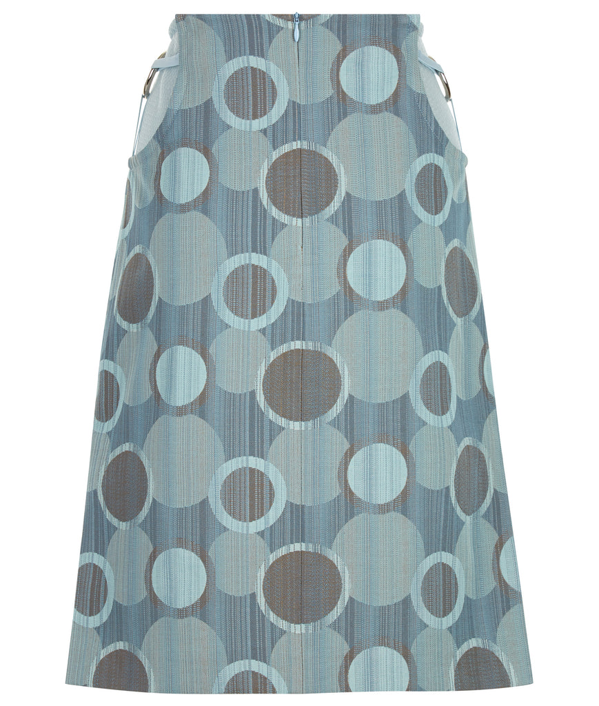 Round Waist Skirt. Medium length skirt in multi coloured sea green weave design. Turbine 3 blade concept design on side hips with stretch trim, over sheer sea green mesh. CB skirt length 59.5cm. 80g approximate weight.