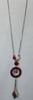 Red Ring Necklace red circle, blue stone multiple beads beige red gold image photo picture