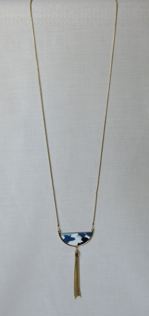 Gold colour light blue white tassle necklace close-up image photo picture