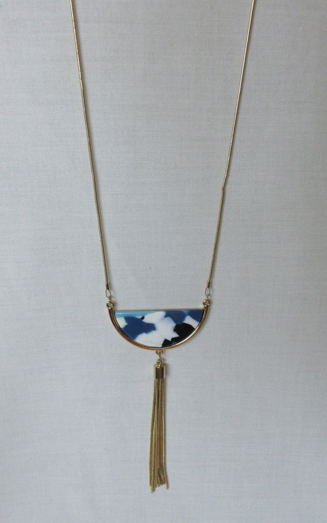 Gold colour light blue white tassle necklace close-up zoom image photo picture