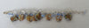 Resin cats eye bracelet  square and circle resin light blue accent circular steel loops image photo picture