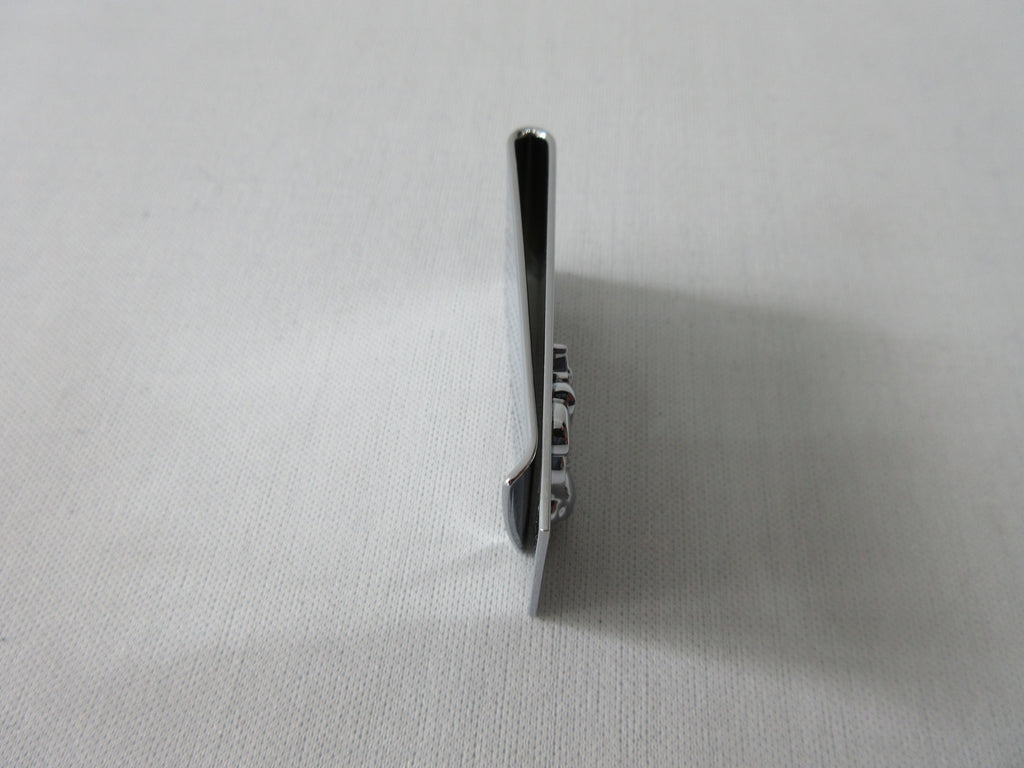 Stainless Steel with moped design 5.5cm x 2.5cm x. 4cm tapering width