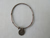 Karyn Chopik Dented Silver Bracelet with Attached Coin Ring, Sterling Silver & Copper, 6.8cm inside diameter, 70g approxmate weight, Made in Canada