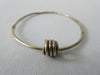 Karen Chopik Fused Quad Ring Bracelet, Sterling Silver, Product Number: 5821, Size M, 6.5cm inside diameter, 45g approximate weight, Made in Canada