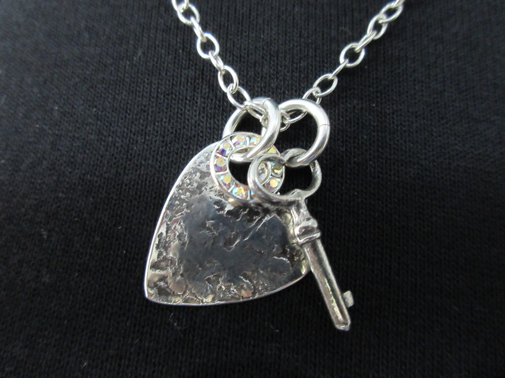 Karyn Chopik Silver Heart & Key Necklace, Item Number N1130, Sterling Silver. Full length 46cm. 50 grams approximate weight. Made in Canada