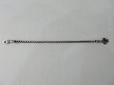 20A60 Shiny Metal Cross Chain. Usage unknown, too small for neck, too large for wrist.  Can be used as an accessory for purse or clothing, with large clip on top end. 100% Stainless Steel. 33cm approximate length. 60 grams approximate weight.