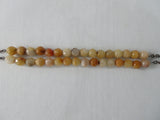 Orange Ball Stone Necklace, 2 sets of geometric polished burnt orange coloured stones (type unknown) Can be doubled as well. Length when worn 44cm. 110 grams approximate weight.