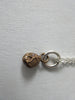 20A63 Brass Person Figure Steel Necklace  Brass person attached to stainless steel chain.  Full length when worn 25cm. 12 grams approximate weight.