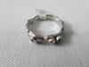 Silver Twisted Ring with 3 Coloured Stones. 3 Coloured Mini-stones on each ring.  All size 8, 30g approximate weight. Sterling Silver, Stainless Steel and Mixed Alloys