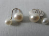 Double Pearl Style Earrings. With curved brass attaching. One pearl unscrewed to put on. Extra piece included x3 pieces total. 5 grams approximate weight. Large pearl .8cm width Small pearl: .6cm width