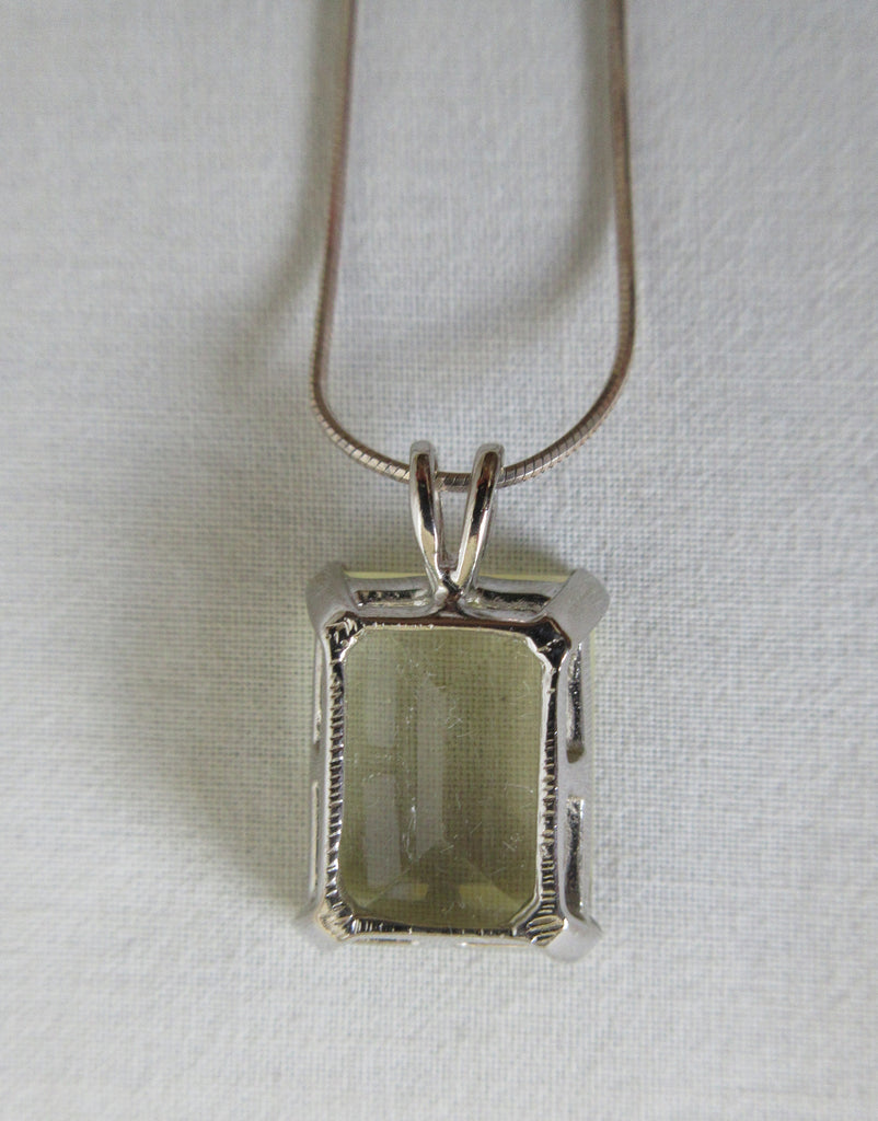 Metallic silver colour choker necklace with large square crystal in metal encasing, Metal unknown, probably stainless steel.  Full length 20cm when worn. Square crystal approx 1.5cm x 2cm, 50g approximate weight, Country of manufacture unknown