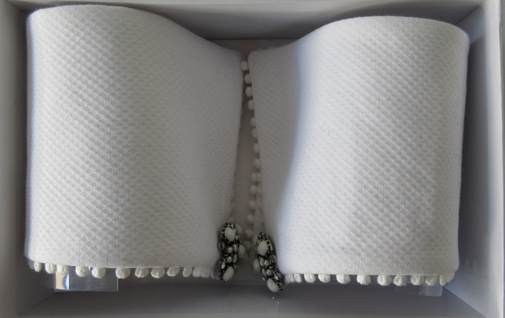 Catherine Osti White Cotton Pique Cuffs. 100% Cotton. Small pleats approximately 3-4mm width. Snap Closure. 19.5cm width snap to snap. 60g approximate weight, comes in white box. Made in France  £155.00