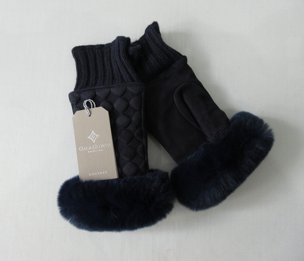 Gala Gloves Couture Navy Fingerless Gloves. Item Number D596SULA048 Blu. Navy Suede fingerless gloves with raised circular dot design, with fur trim for fingers. Navy knit base, suede gloves and fur trim. Made in Italy