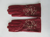 Gala Gloves Deep Red Gloves with Cutout Applique Design. Item Number D544CONSO26 RHUM 948.005. Featuring woven strips and floral pattern design. Made in Italy. 60g approximate weight