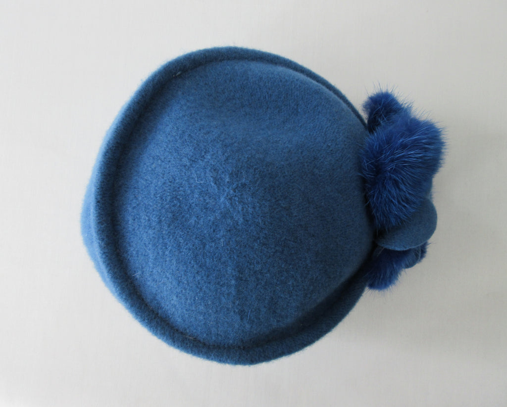 Blue Wool Hat with Mink Trim. Canadian Hat Company. Felt style, with bit of a stretch. Size unknown; inside radius 58cm. 20g approximate weight. Made in Canada