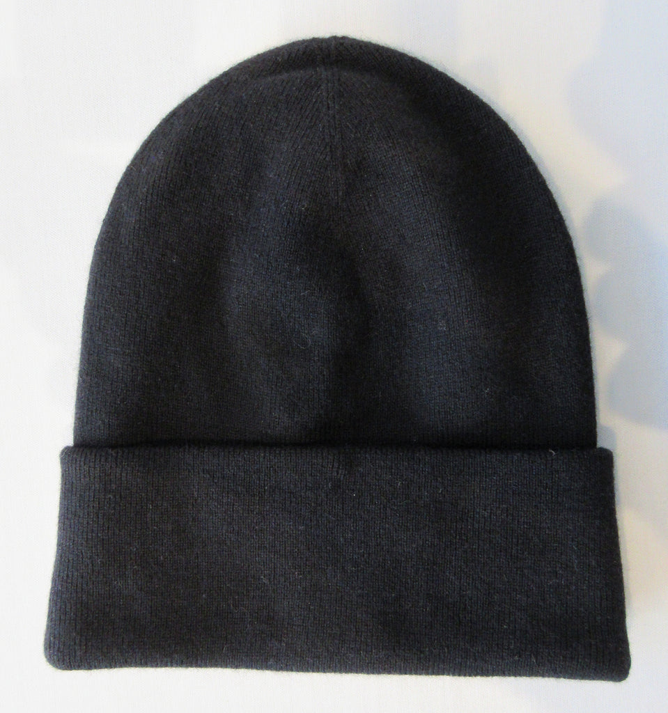 Regina Black Crystal Folding Hat. Knit Cap in Black with black shiny mini Swarowski crystals on front. Crystals can be displayed full front or worn sideways. 8cm width fold. Article 90733 SUS8M Nero. Width 21cm. Height 24cm. 55g approximate weight. 70% Wool, 30% Cashmere. Hand wash, Hang dry only. Made in Italy