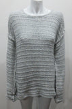 Chunky but light and airy knit jumper in pale ice blue colour. Hand knit style with super soft yarn. Size M