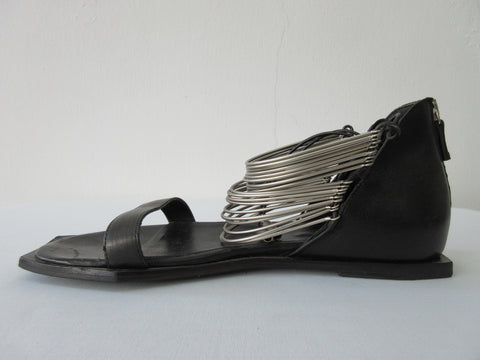 20S08B -Vic Matie Black Curved Metal Heels