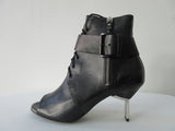 Vic Matie Laced & Buckled Open Toe Boot. Product Number: Vic Matie 1N6996D.NB2N20101 San/Tro Magritte 101 Black with 4cm Metal Heel. 100% Leather. Made in Italy